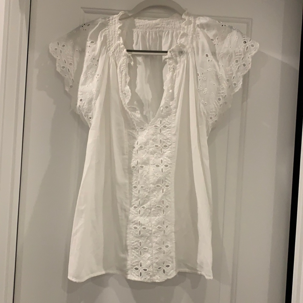 White eyelet blouse with flutter sleeve